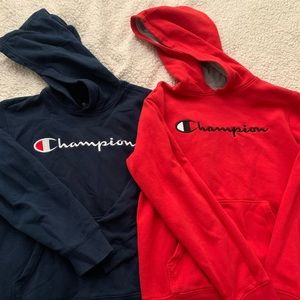 Lot of two boys champion hoodies. One large and one extra large.